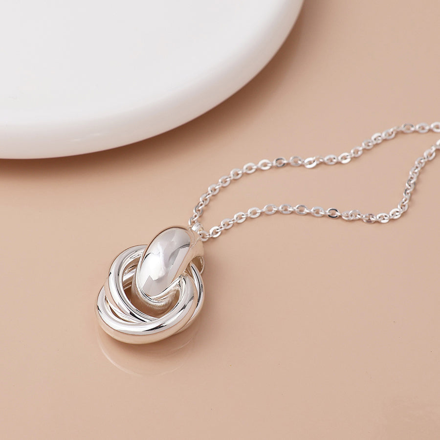 Silver plated polished knot necklace