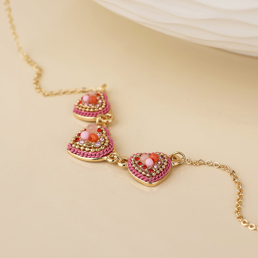 POM - Clara faux gold plated beaded pink triple heart necklace