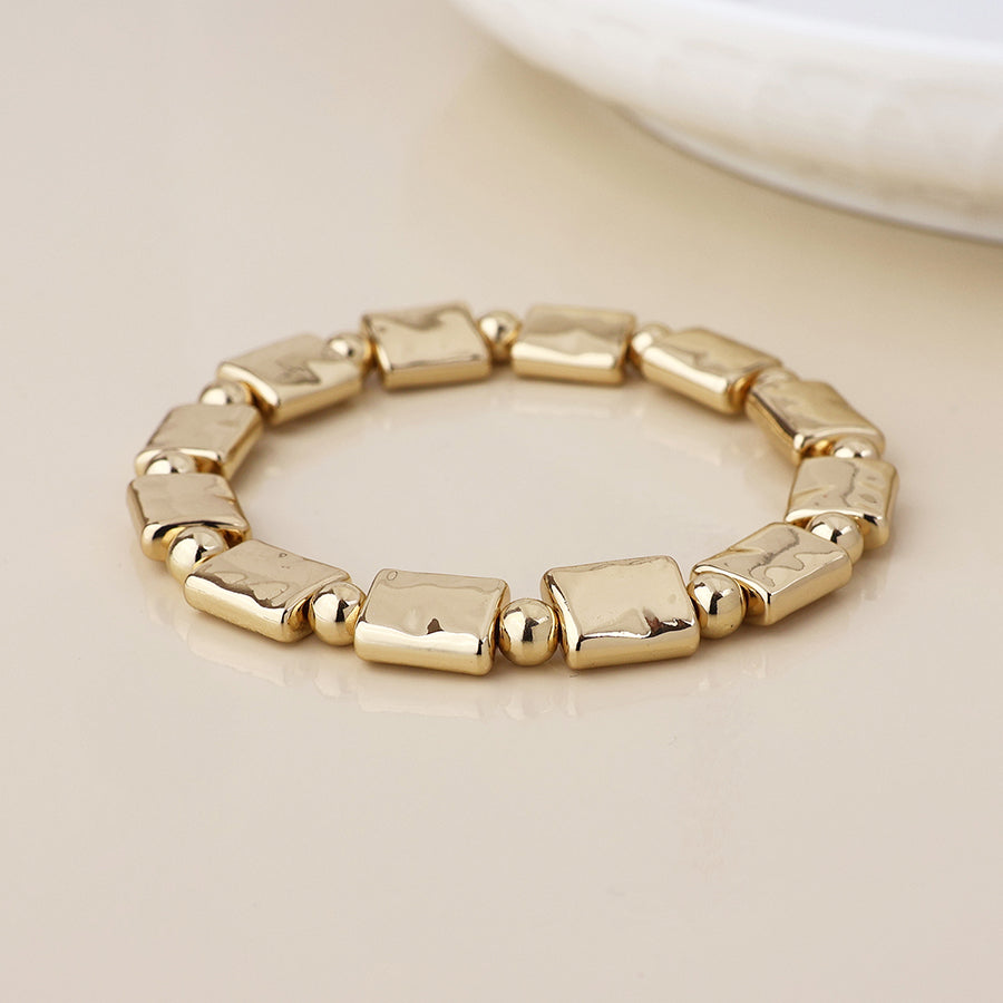 POM - Cassia golden polished bead and oblong stretch bracelet