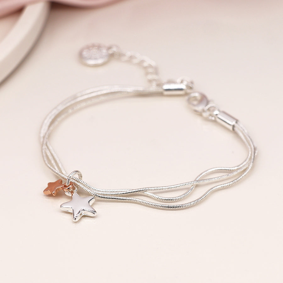 Triple chain bracelet with rose gold/silver stars
