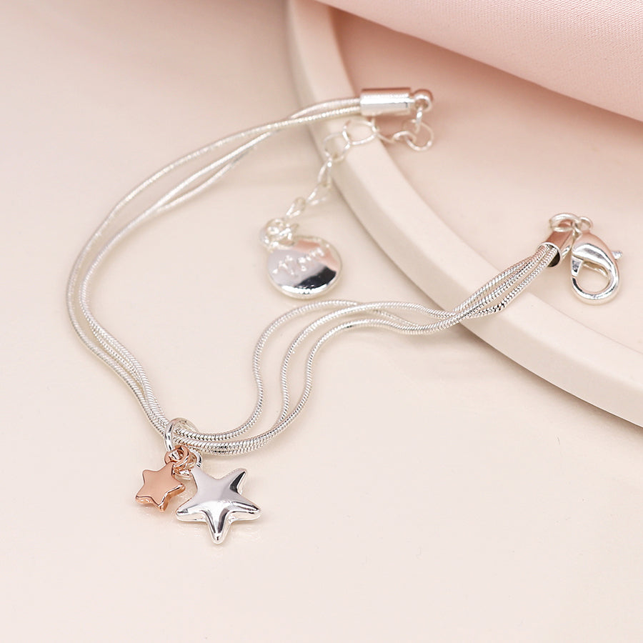 Triple chain bracelet with rose gold/silver stars