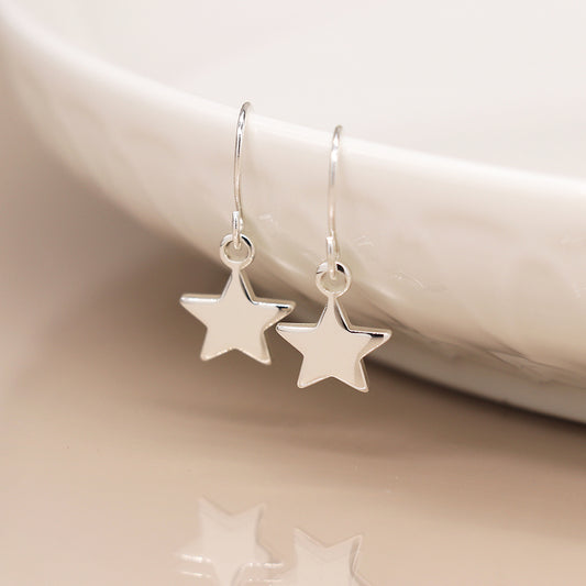 Silver plated star drop earrings