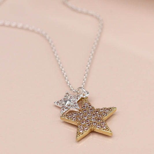 Faux gold and silver plated double crystal inset star necklace