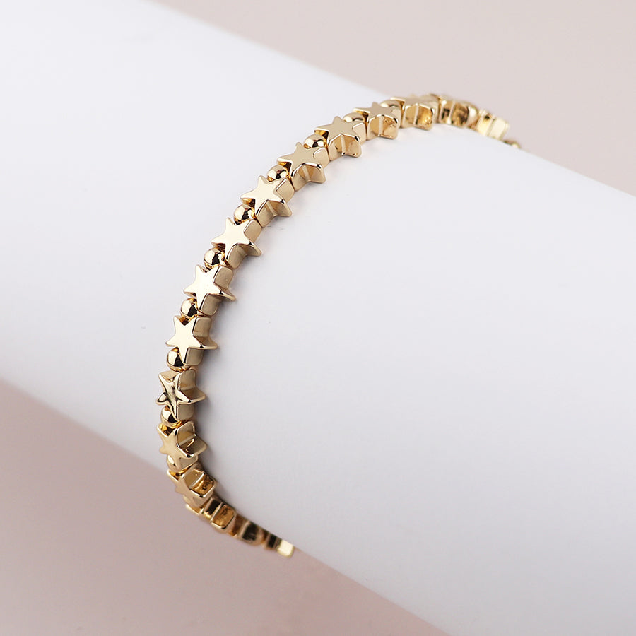 POM - Golden polished stars bead bracelet