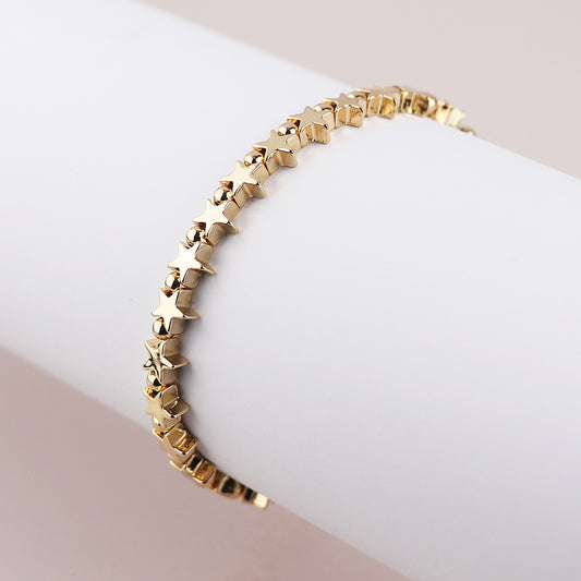 POM - Golden polished stars bead bracelet