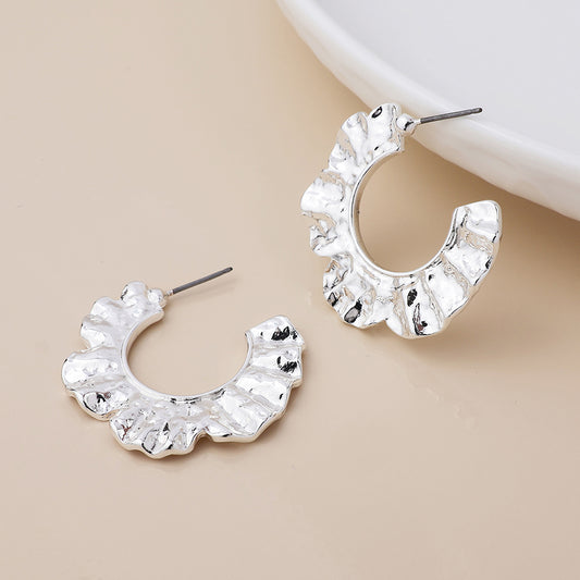 Silver plated textured wave hoop earrings