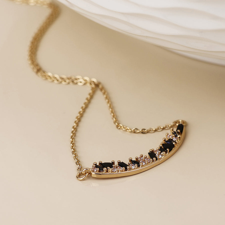 POM - Maggie faux gold plated curved bar and black mix crystals necklace