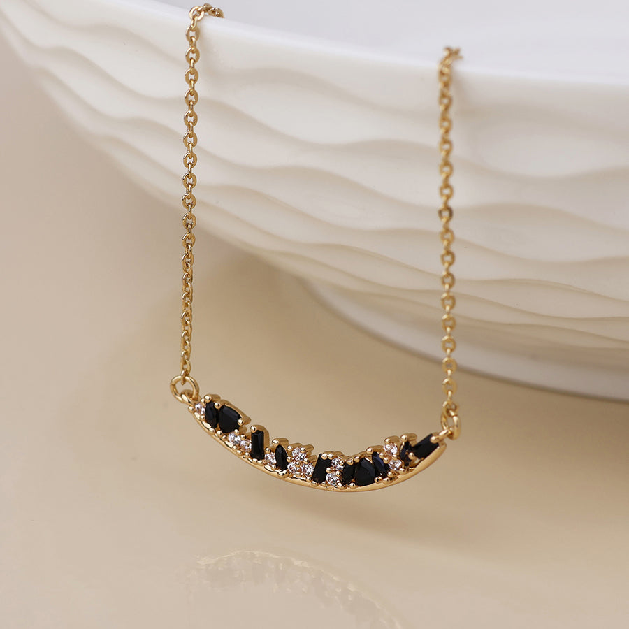 POM - Maggie faux gold plated curved bar and black mix crystals necklace