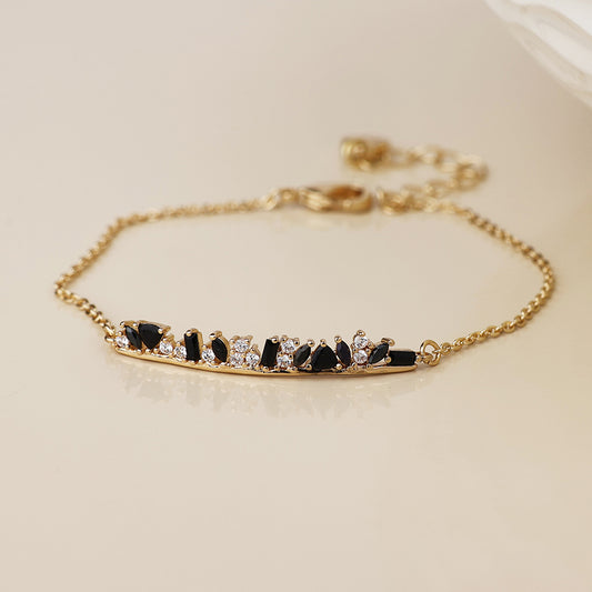 POM - Maggie faux gold plated curved bar and black mix crystals bracelet