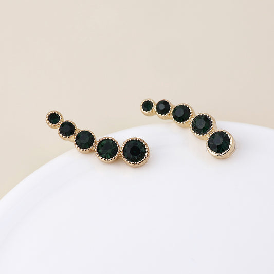 POM - Maggie faux gold plated dark toned crystal ear climbers