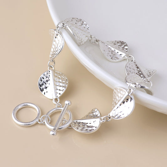 POM - Ivy silver plated hammered twist discs bracelet