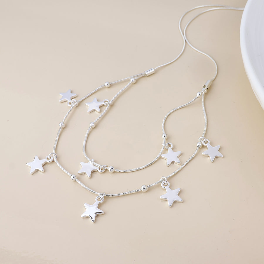 POM - Stardust silver plated double strand star drops necklace