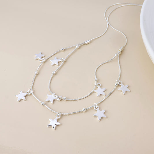 POM - Stardust silver plated double strand star drops necklace