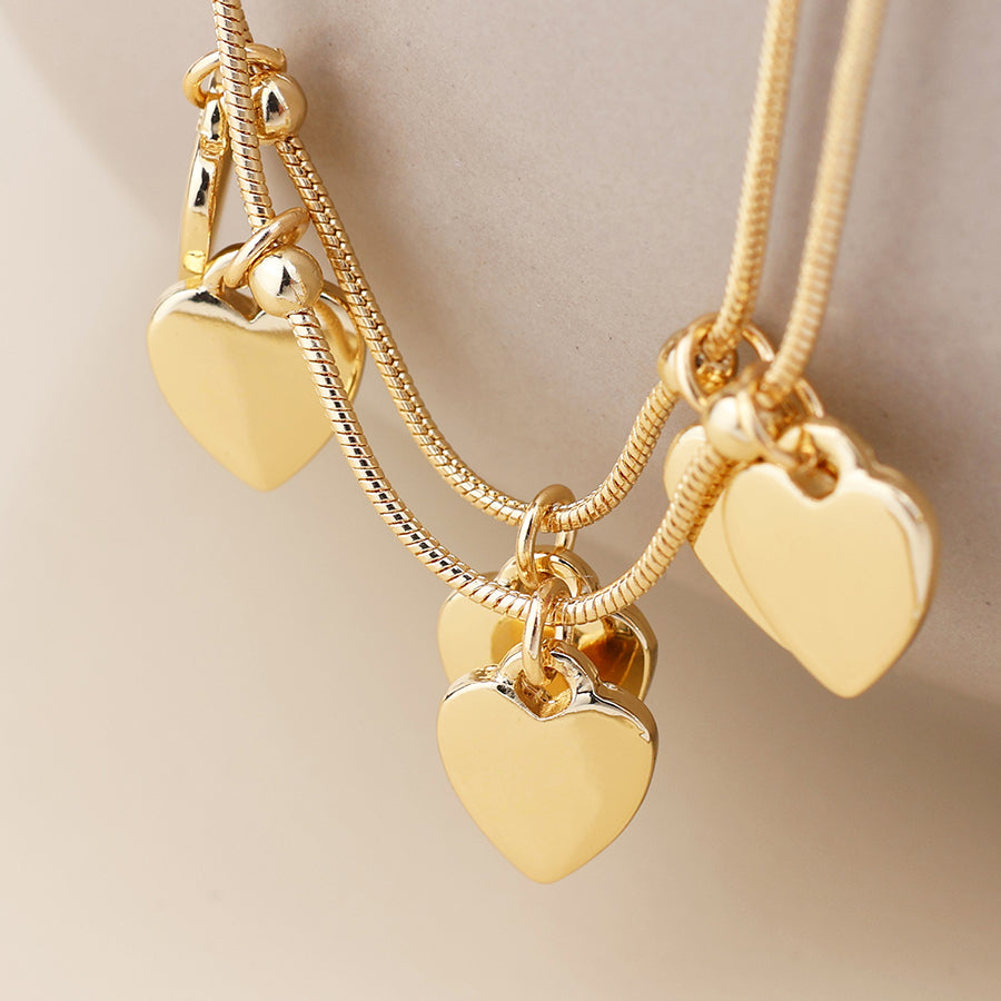 POM - Moonbeam Golden double strand heart drops bracelets