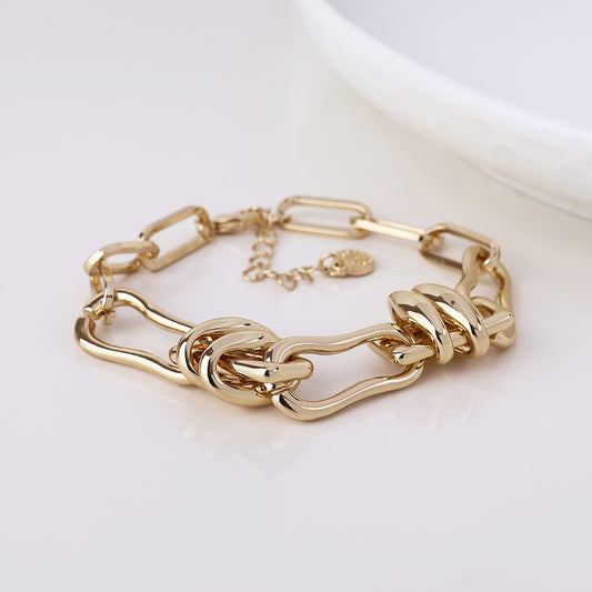 POM - Odyssey golden polished mixed link bracelet