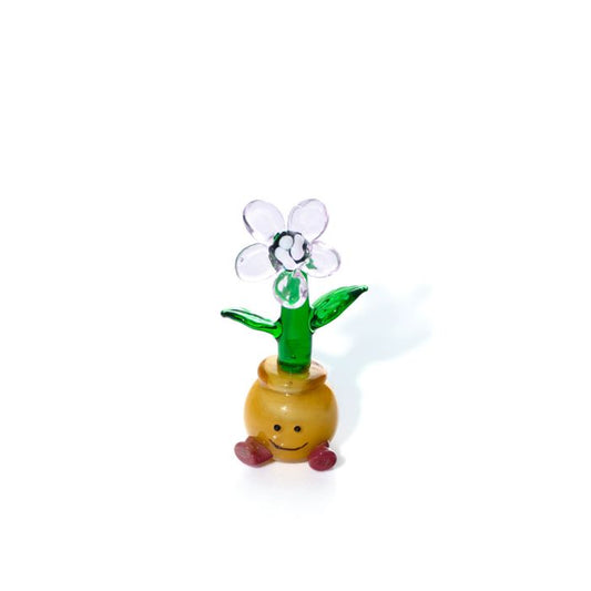 Glass flower in sitting plant pot