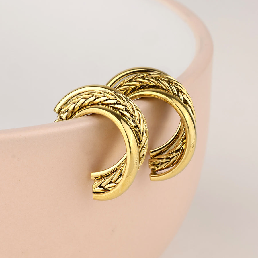 POM - Trinity stainless steel gold plated layered twist hoop earrings