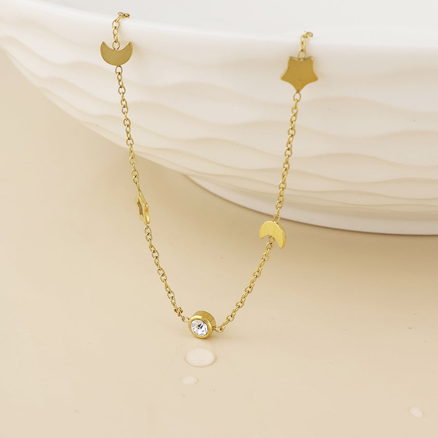 POM - Lumi stainless steel gold plated celestial charm and crystal necklace