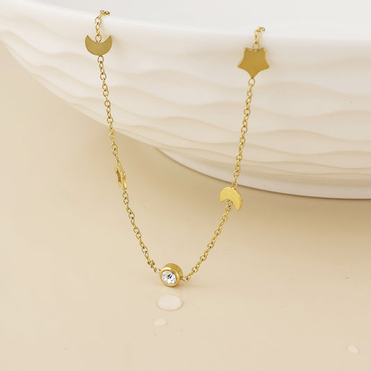 POM - Lumi stainless steel gold plated celestial charm and crystal necklace