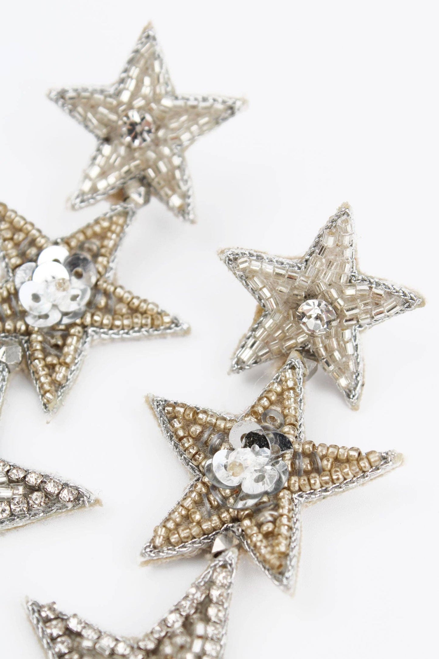 TRIPLE SILVER STAR EARRINGS